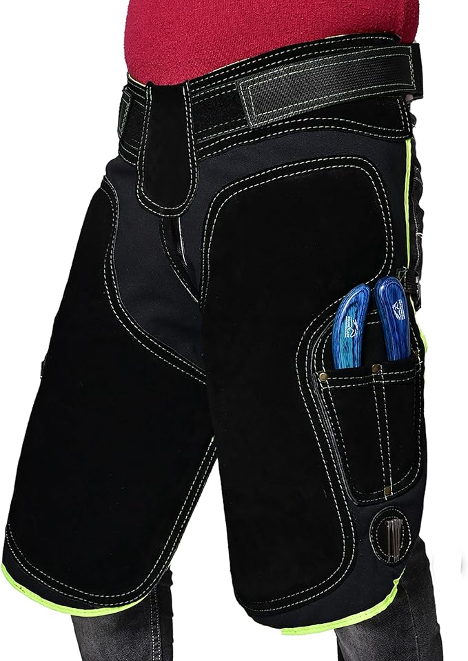 Equine Care Women’s Farrier Apron Chaps 23″ – Leather & Canvas, Adjustable 28–52″ Waist, EVA Padded Knees, Lumbar Support, 4 Knife Pockets & Nail Magnets for Hoof Trimming (Black with Green Piping)